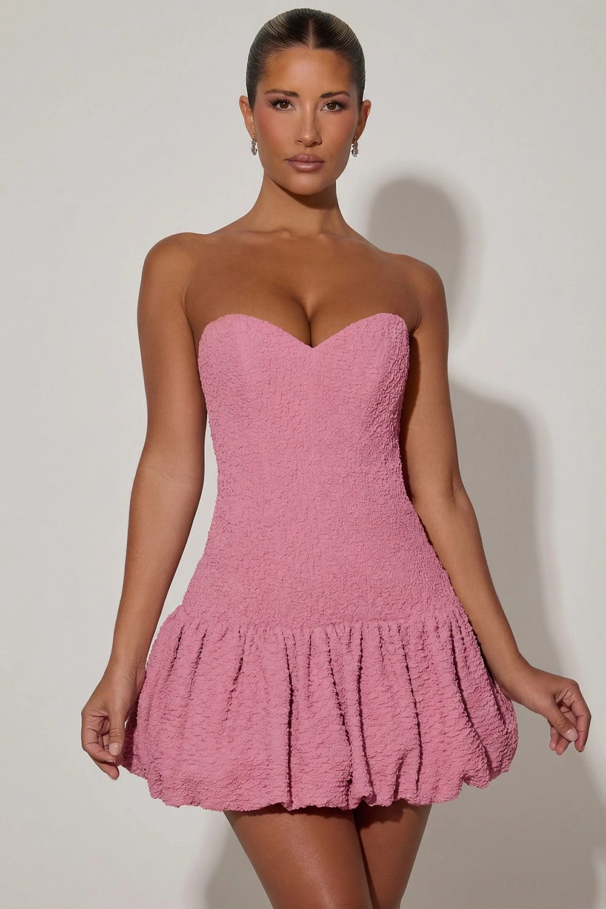 Cut-Out Bubble Hem Corset Mini Dress in Dusty Pink